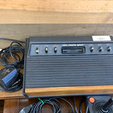 Atari 2600 Console(w/1Joystick, 1set of paddles, Power Adapter, Coaxial Adapter)