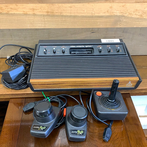 Atari 2600 Console(w/1Joystick, 1set of paddles, Power Adapter, Coaxial Adapter)